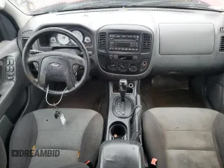 2006 Ford Escape XLS с VIN 1FMYU02Z06KC04969, выставлен на аукционе Copart как лот 84412034 с пробегом 138 334 миль миль и Списание • Salvage title. История ставок и продаж доступна на DreamBid. Изображение 8.