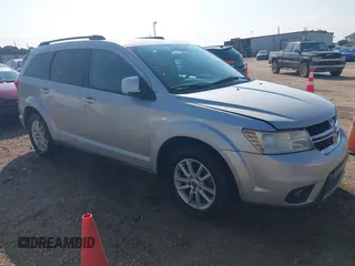 2013 Dodge Journey SXT with VIN 3C4PDCBG1DT623537, listed as a IAAI auction lot 42839471 with 101,154 mi miles and . Bid and sale history available at DreamBid. Image 1.