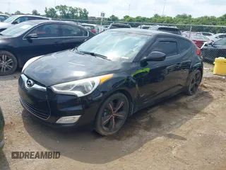 2013 Hyundai Veloster w/Black Int с VIN KMHTC6ADXDU084704, выставлен на аукционе IAAI как лот 42443297 с пробегом 111 587 миль миль и . История ставок и продаж доступна на DreamBid. Изображение 2.
