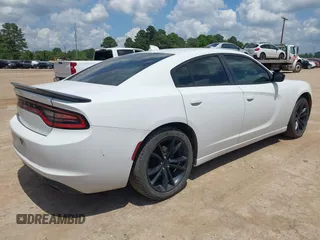 2016 Dodge Charger SXT with VIN 2C3CDXHG1GH174892, listed as a IAAI auction lot 42096098 with 244,598 mi miles and . Bid and sale history available at carsss.com. Image 4.