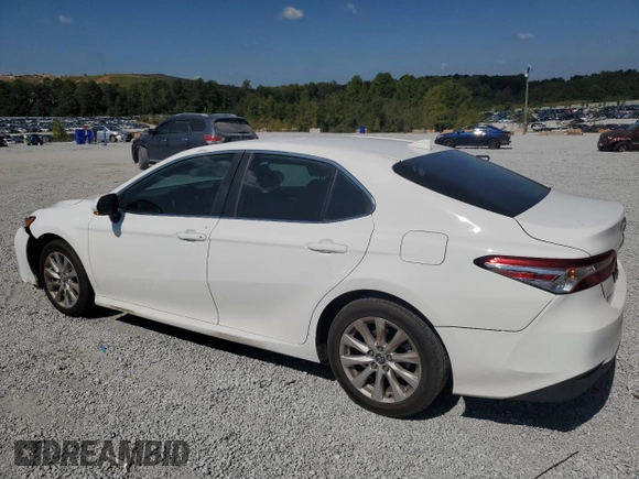 2020 Toyota Camry LE with VIN 4T1L11AK6LU900443, listed as a Copart auction lot 72664744 with 106,317 mi miles and Salvage Title. Bid and sale history available at DreamBid. Image 2.