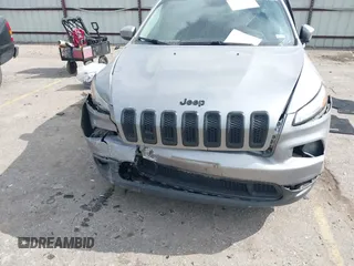 2016 Jeep Cherokee Latitude with VIN 1C4PJLCB3GW107402, listed as a IAAI auction lot 41505242 with 110,994 mi miles. Bid and sale history available at carsss.com. Image 6.