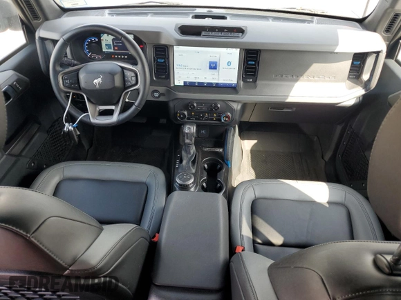 2024 Ford Bronco with VIN 1FMDE1BH6RLA31465, listed as a Copart auction lot 74325424 with 15,627 mi miles and Salvage title. Bid and sale history available at DreamBid. Image 8.