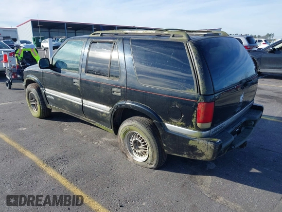 1998 GMC Jimmy SLT with VIN 1GKDT13W5W2502521, listed as a IAAI auction lot 41579741 with 176,802 mi miles. Bid and sale history available at carsss.com. Image 3.