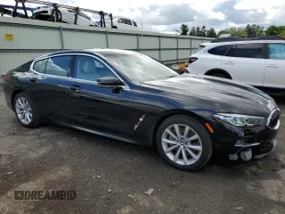 2020 BMW 8 Series 840i with VIN WBAGV4C05LCD71158, listed as a Copart auction lot 50589173 with 23,652 mi miles. Bid and sale history available at carsss.com. Image 4.
