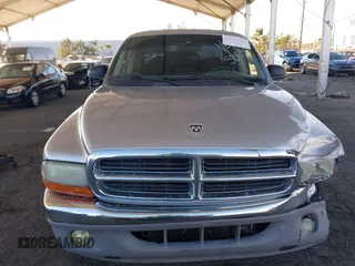2003 Dodge Dakota SLT with VIN 1D7HL48N13S294573, listed as a IAAI auction lot 41291127 with 227,355 mi miles. Bid and sale history available at carsss.com. Image 12.