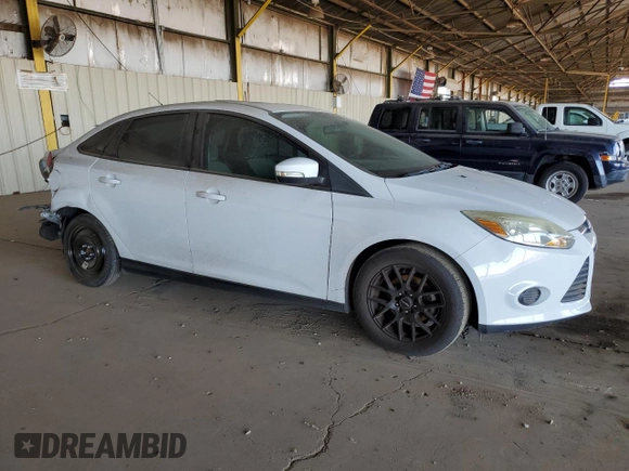 2013 Ford Focus SE z VIN 1FADP3F23DL222405, wystawiony jako Copart lot #54747795 z przebiegiem 88 472 mil mil oraz Szkody całkowita. Historia ofert i sprzedaży dostępna na DreamBid. Obrazek 4.