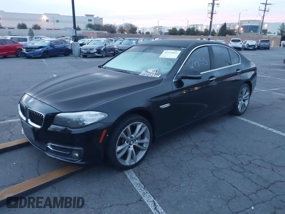 2014 BMW 5 Series 535i with VIN WBA5B1C54ED917047, listed as a IAAI auction lot 41727855 with 105,460 mi miles and . Bid and sale history available at DreamBid. Image 2.
