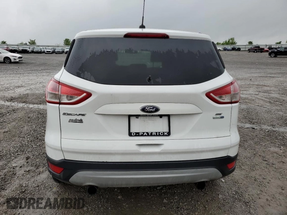 2013 Ford Escape SE with VIN 1FMCU9GX7DUA24721, listed as a Copart auction lot 54543385 with 203,036 mi miles and Salvage title. Bid and sale history available at DreamBid. Image 6.