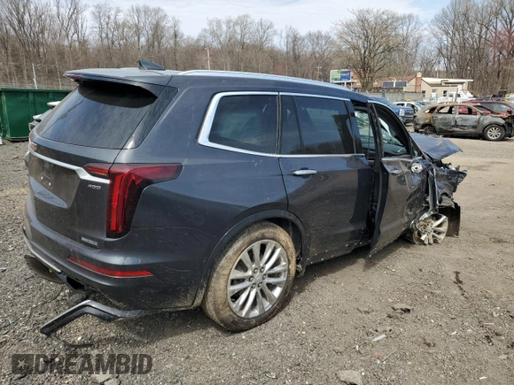 2022 Cadillac XT6 Premium Luxury with VIN 1GYKPDRS9NZ120814, listed as a Copart auction lot 51143485 with 70,977 mi miles and Salvage Title. Bid and sale history available at carsss.com. Image 3.