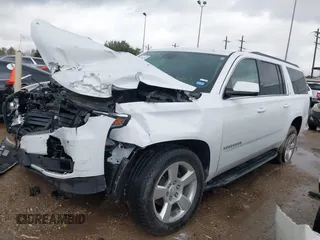 2020 Chevrolet Suburban LT z VIN 1GNSCHKC9LR284936, wystawiony jako IAAI lot #41196246 z przebiegiem Nie podano mil oraz . Historia ofert i sprzedaży dostępna na DreamBid. Obrazek 2.