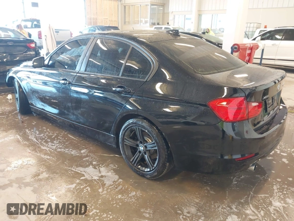 2015 BMW 3 Series 320i xDrive with VIN WBA3C3C56FK203031, listed as a IAAI auction lot 41012182 with 83,611 mi miles and . Bid and sale history available at DreamBid. Image 3.