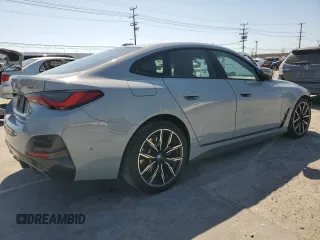 2022 BMW i4 eDrive40 with VIN WBY73AW07NFN14854, listed as a Copart auction lot 54082504 with 10,936 mi miles. Bid and sale history available at carsss.com. Image 3.