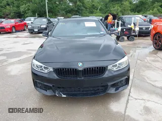 2014 BMW 4 Series 428i with VIN WBA3N7C58EF719495, listed as a IAAI auction lot 42490625 with 179,410 mi miles and . Bid and sale history available at DreamBid. Image 13.