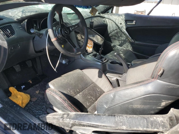 2014 Hyundai Genesis Coupe 2.0T z VIN KMHHT6KD4EU120439, wystawiony jako Copart lot #77393784 z przebiegiem Nie podano mil oraz Szkoda całkowita • Salvage title. Historia ofert i sprzedaży dostępna na DreamBid. Obrazek 8.