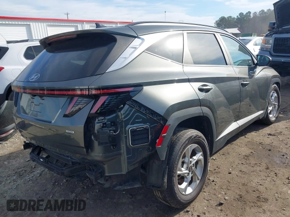 2022 Hyundai Tucson SEL with VIN 5NMJBCAEXNH031855, listed as a IAAI auction lot 41677386 with 40,606 mi miles and . Bid and sale history available at DreamBid. Image 4.
