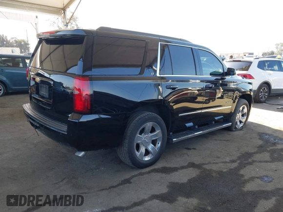 2016 Chevrolet Tahoe LT with VIN 1GNSKBKC5GR481043, listed as a IAAI auction lot 41968681 with 156,172 mi miles and . Bid and sale history available at DreamBid. Image 4.