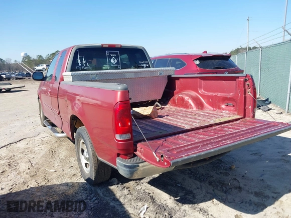 2000 Ford F-150 XL with VIN 1FTZX1725YNA94343, listed as a IAAI auction lot 41659358 with 295,337 mi miles. Bid and sale history available at carsss.com. Image 13.