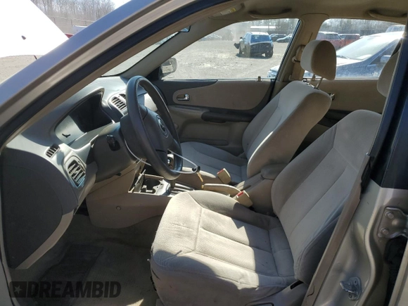2002 Mazda Protege DX with VIN JM1BJ225520525472, listed as a Copart auction lot 45699915 with 183,457 mi miles and Salvage Title. Bid and sale history available at DreamBid. Image 7.