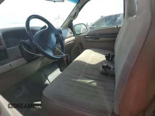 2001 Ford F-250 XL z VIN 1FTNF21L31EC98816, wystawiony jako Copart lot #72825944 z przebiegiem 145 083 mil mil oraz Szkoda całkowita • Salvage title. Historia ofert i sprzedaży dostępna na DreamBid. Obrazek 7.