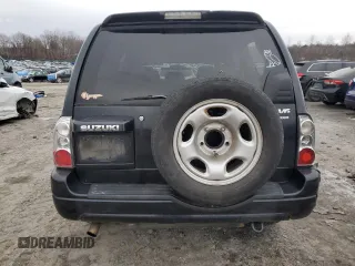 2004 Suzuki XL7 LX z VIN JS3TX92V344110661, wystawiony jako Copart lot #43613315 z przebiegiem 143 334 mil mil oraz Szkoda całkowita • Salvage title. Historia ofert i sprzedaży dostępna na DreamBid. Obrazek 6.