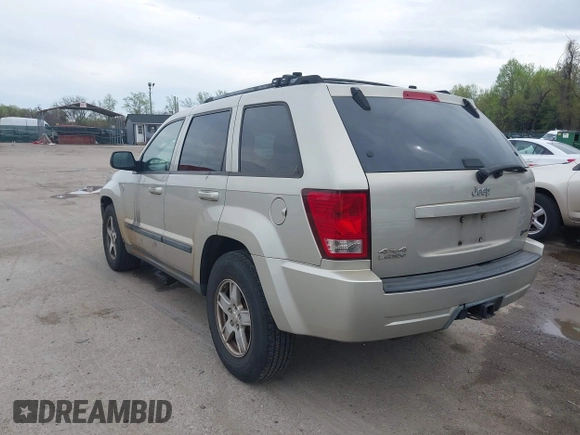 2007 Jeep Grand Cherokee Laredo z VIN 1J8HR48P77C548578, wystawiony jako IAAI lot #41974603 z przebiegiem 179 280 mil mil oraz . Historia ofert i sprzedaży dostępna na DreamBid. Obrazek 3.