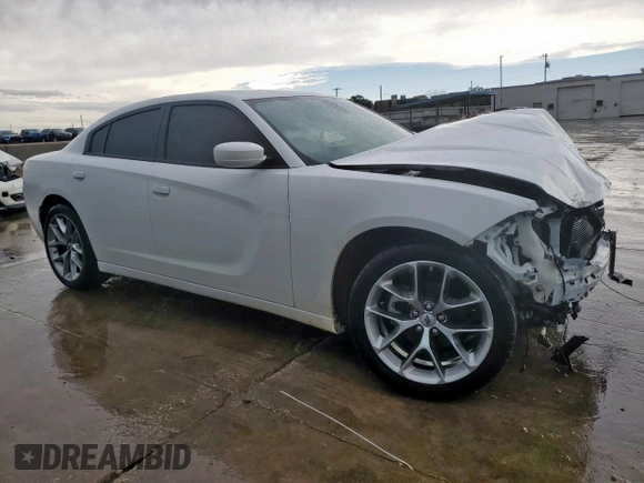2022 Dodge Charger SXT with VIN 2C3CDXBG6NH166941, listed as a Copart auction lot 54659165 with 26,409 mi miles and Salvage Title. Bid and sale history available at DreamBid. Image 4.