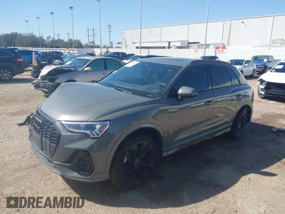 2020 Audi Q3 S line Premium Plus with VIN WA1EECF38L1089559, listed as a IAAI auction lot 41715264 with 74,192 mi miles and . Bid and sale history available at DreamBid. Image 2.