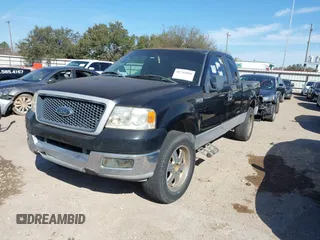 2005 Ford F-150 STX with VIN 1FTRX12W75FA20387, listed as a IAAI auction lot 41741066 with 176,705 mi miles. Bid and sale history available at carsss.com. Image 2.