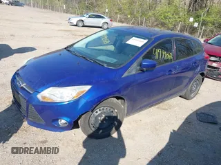 2012 Ford Focus SE z VIN 1FAHP3K28CL297610, wystawiony jako IAAI lot #41999068 z przebiegiem 164 482 mil mil oraz . Historia ofert i sprzedaży dostępna na DreamBid. Obrazek 17.