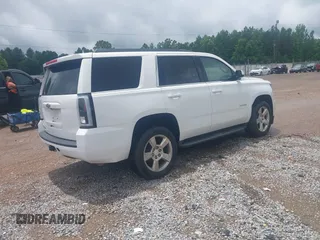 2017 Chevrolet Tahoe LS with VIN 1GNSCAKC7HR342637, listed as a IAAI auction lot 42335097 with 149,736 mi miles and . Bid and sale history available at DreamBid. Image 4.