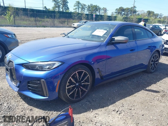 2024 BMW i4 M50 z VIN WBY33AW09RFS60679, wystawiony jako IAAI lot #41983706 z przebiegiem 2665 mil mil oraz . Historia ofert i sprzedaży dostępna na DreamBid. Obrazek 22.