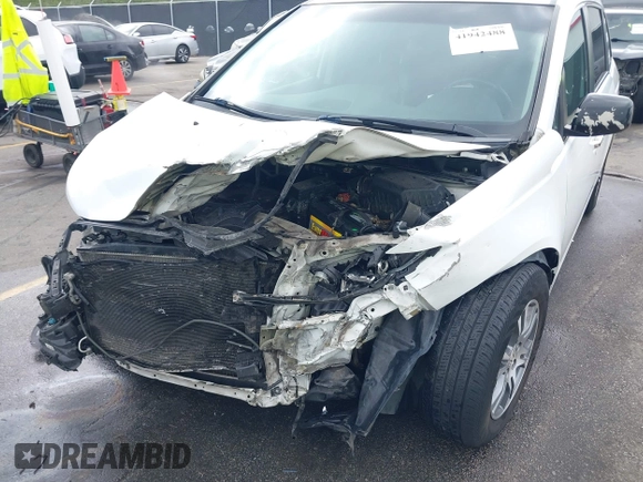 2012 Honda Odyssey EX-L with VIN 5FNRL5H60CB134954, listed as a IAAI auction lot 41942488 with 192,069 mi miles and . Bid and sale history available at DreamBid. Image 6.