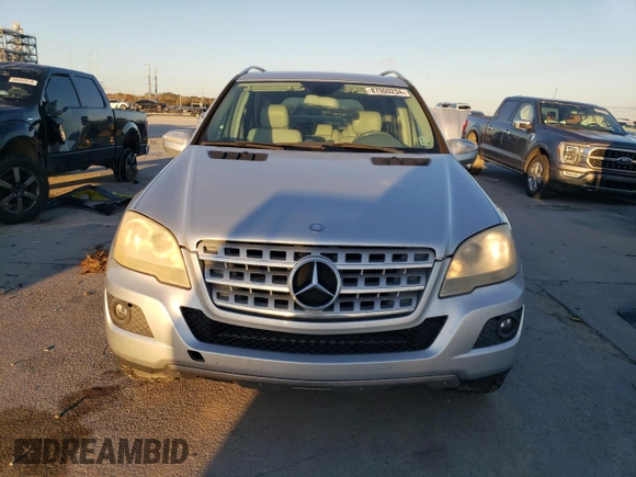 2009 Mercedes-Benz M 3.5L with VIN 4JGBB56EX9A521264, listed as a Copart auction lot 87000234 with 239,700 mi miles and Clean Title. Bid and sale history available at carsss.com. Image 5.