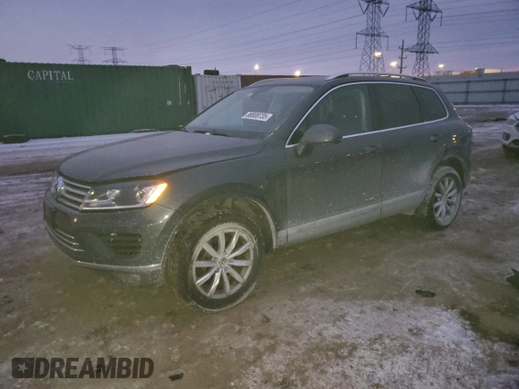 2016 Volkswagen Touareg Sport with VIN WVGEF9BP2GD005296, listed as a Copart auction lot 88808735 with 133,429 mi miles and Salvage Title. Bid and sale history available at DreamBid. Image 1.