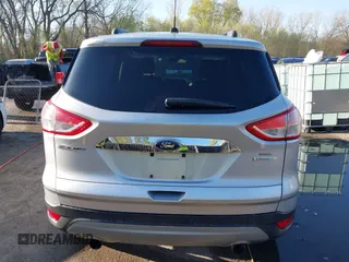 2013 Ford Escape SEL with VIN 1FMCU0HX4DUB98238, listed as a IAAI auction lot 41973221 with 131,590 mi miles and . Bid and sale history available at DreamBid. Image 17.