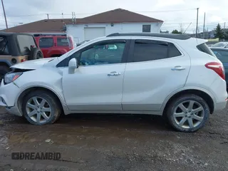 2017 Buick Encore Essence with VIN KL4CJGSB4HB081550, listed as a IAAI auction lot 41230961 with 112,991 mi miles and . Bid and sale history available at DreamBid. Image 14.
