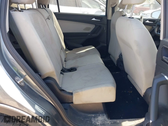 2018 Volkswagen Tiguan S with VIN 3VV0B7AX7JM104662, listed as a IAAI auction lot 41781658 with 235,461 mi miles and . Bid and sale history available at DreamBid. Image 8.