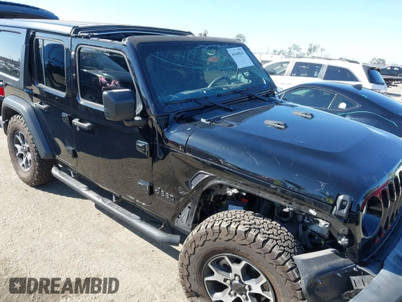 2023 Jeep Wrangler Willys with VIN 1C4HJXDN0PW597768, listed as a IAAI auction lot 41645815 with 23,717 mi miles and . Bid and sale history available at DreamBid. Image 6.