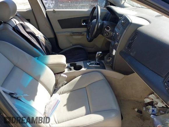 2007 Cadillac CTS z VIN 1G6DM57T970170888, wystawiony jako IAAI lot #40977052 z przebiegiem 169 780 mil mil oraz . Historia ofert i sprzedaży dostępna na DreamBid. Obrazek 5.