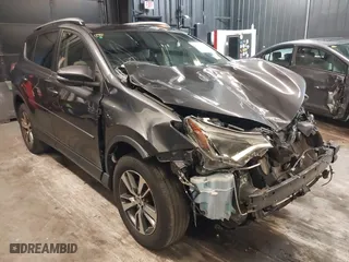 2018 Toyota RAV4 XLE with VIN JTMRFREV9JJ224779, listed as a IAAI auction lot 41888255 with 137,973 mi miles. Bid and sale history available at carsss.com. Image 1.