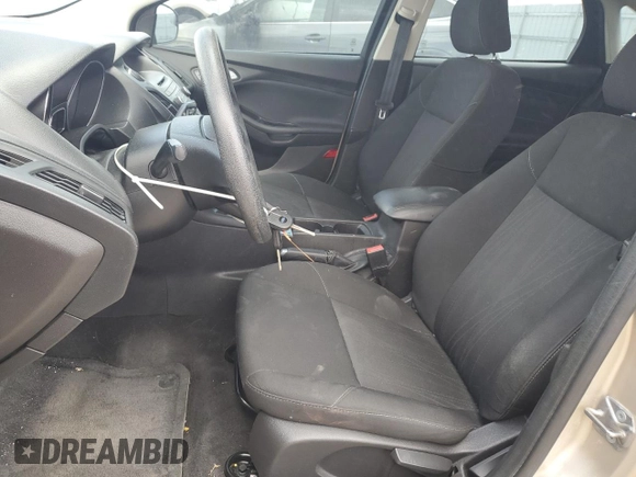 2017 Ford Focus SE with VIN 1FADP3F28HL299535, listed as a Copart auction lot 56958885 with 102,179 mi miles and Clean title. Bid and sale history available at DreamBid. Image 7.