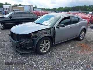 2014 Dodge Avenger SE with VIN 1C3CDZAB2EN226741, listed as a IAAI auction lot 42480032 with 143,797 mi miles and . Bid and sale history available at DreamBid. Image 2.