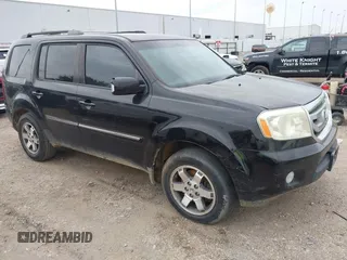 2009 Honda Pilot Touring z VIN 5FNYF38999B020204, wystawiony jako IAAI lot #42782627 z przebiegiem 218 891 mil mil oraz . Historia ofert i sprzedaży dostępna na DreamBid. Obrazek 1.