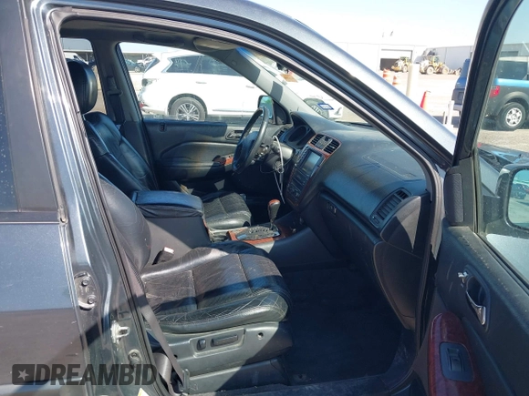 2005 Acura MDX Touring with VIN 2HNYD18975H523951, listed as a IAAI auction lot 41979596 with 198,876 mi miles. Bid and sale history available at carsss.com. Image 5.
