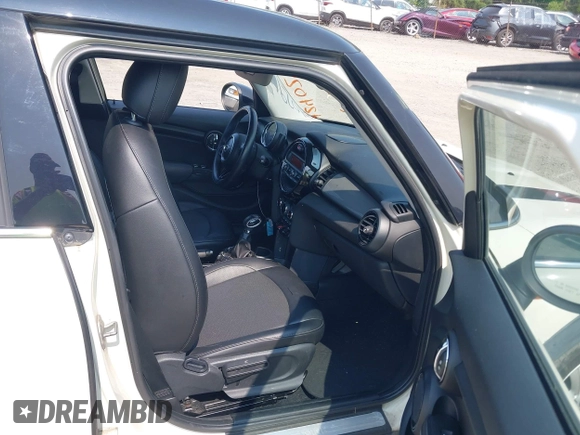 2015 MINI Hardtop 4 Door with VIN WMWXS5C5XFT827330, listed as a IAAI auction lot 42402965 with 140,648 mi miles and . Bid and sale history available at DreamBid. Image 5.