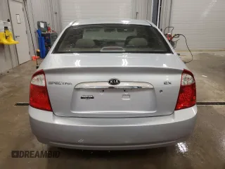 2005 Kia Spectra LX with VIN KNAFE121655148281, listed as a Copart auction lot 76677864 with 115,299 mi miles and Clean Title. Bid and sale history available at carsss.com. Image 6.