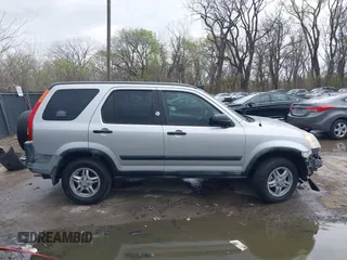 2002 Honda CR-V LX z VIN JHLRD78402C077631, wystawiony jako IAAI lot #41918750 z przebiegiem 186 827 mil mil oraz . Historia ofert i sprzedaży dostępna na DreamBid. Obrazek 13.