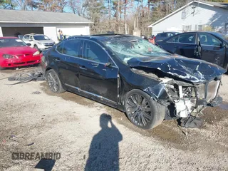 2014 Kia Cadenza Premium with VIN KNALN4D77E5163619, listed as a IAAI auction lot 40759426 with 154,368 mi miles. Bid and sale history available at carsss.com. Image 1.