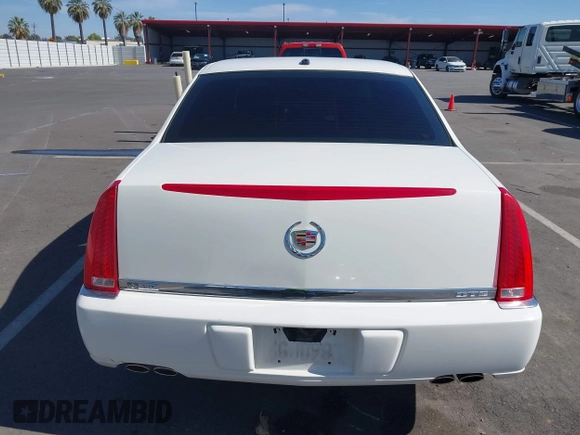 2007 Cadillac DTS Luxury I z VIN 1G6KD57Y77U133267, wystawiony jako IAAI lot #42337188 z przebiegiem 126 063 mil mil oraz . Historia ofert i sprzedaży dostępna na DreamBid. Obrazek 17.